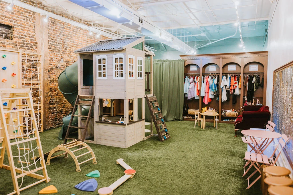 The play space at Corals Closet, with climbing equipment and room for imaginative play